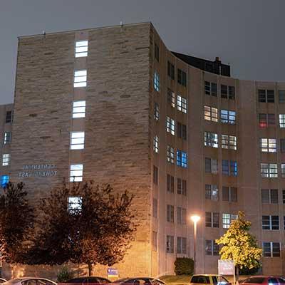 a nighttime exterior shot of the CTE dorm building